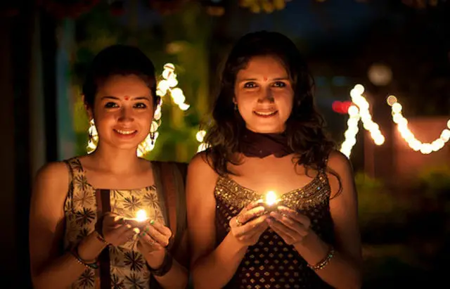 Diwali Girls with Diya Lights Lamp