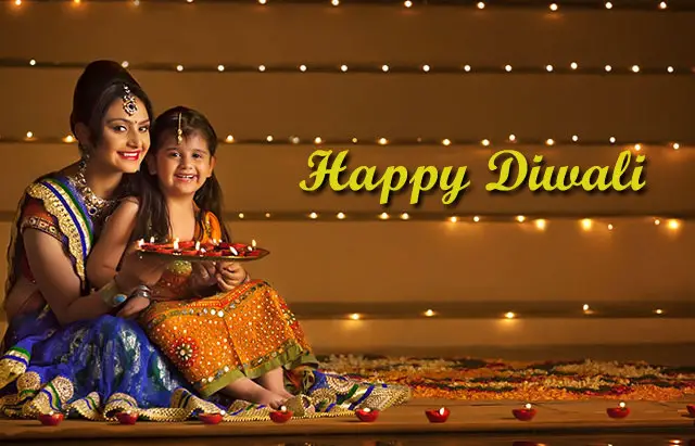 Cute Mom Daughter Celebrating Diwali photos