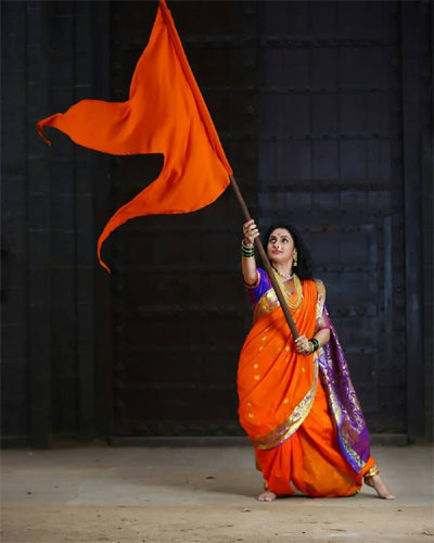 Bhagwa Flag in Ladies Hand
